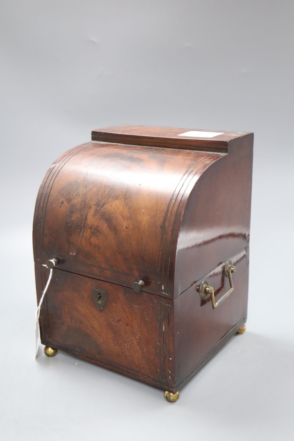 A 19th century Belgian mahogany decanter box containing three gilt decanters